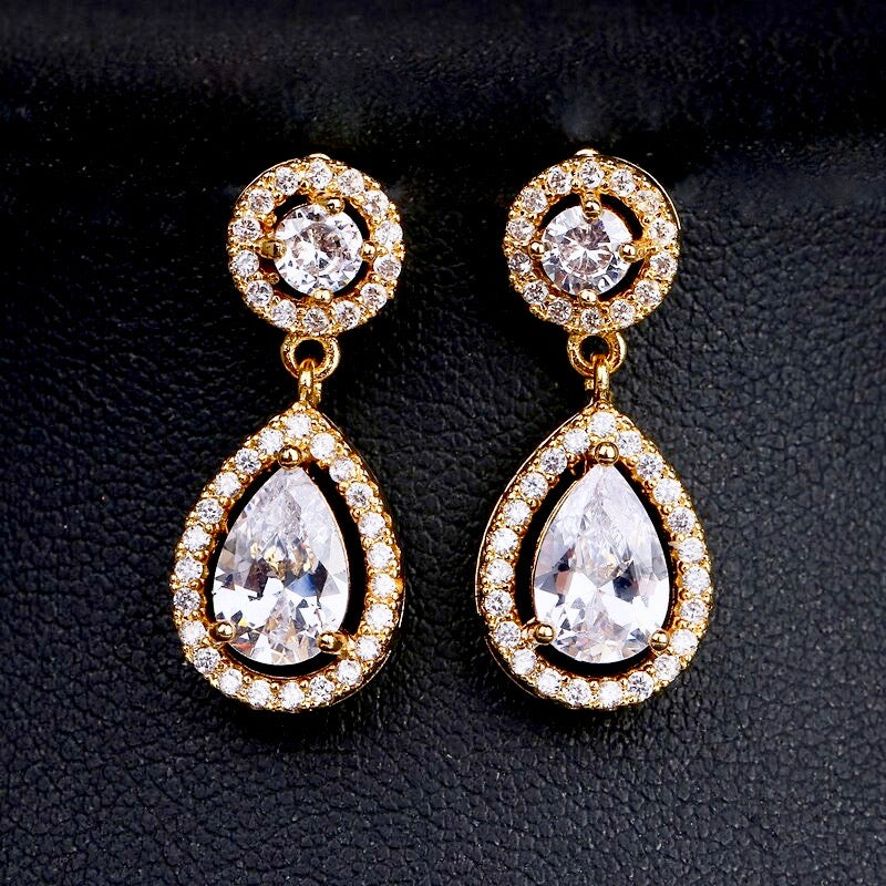 https://www.adorabysimona.com/products/ilana-cubic-zirconia-bridal-earrings-available-in-silver-and-yellow-gold