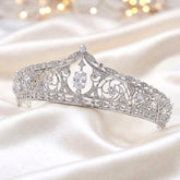 //www.adorabysimona.com/cdn/shop/files/Monica_-_Silver_CZ_Bridal_Tiara_Crown_ADORA_by_Simona.jpg?v=1788311728&width=165