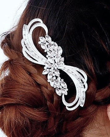Bold and beautiful, this exquisite hair accessory is a unique addition to your bridal ensemble.