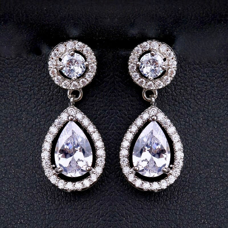 https://www.adorabysimona.com/products/ilana-cubic-zirconia-bridal-earrings-available-in-silver-and-yellow-gold